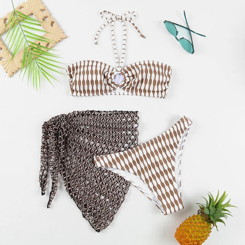 Women's striped three-piece swimsuit set with tube top, shorts, and waist skirt hem in colour option as pictured.