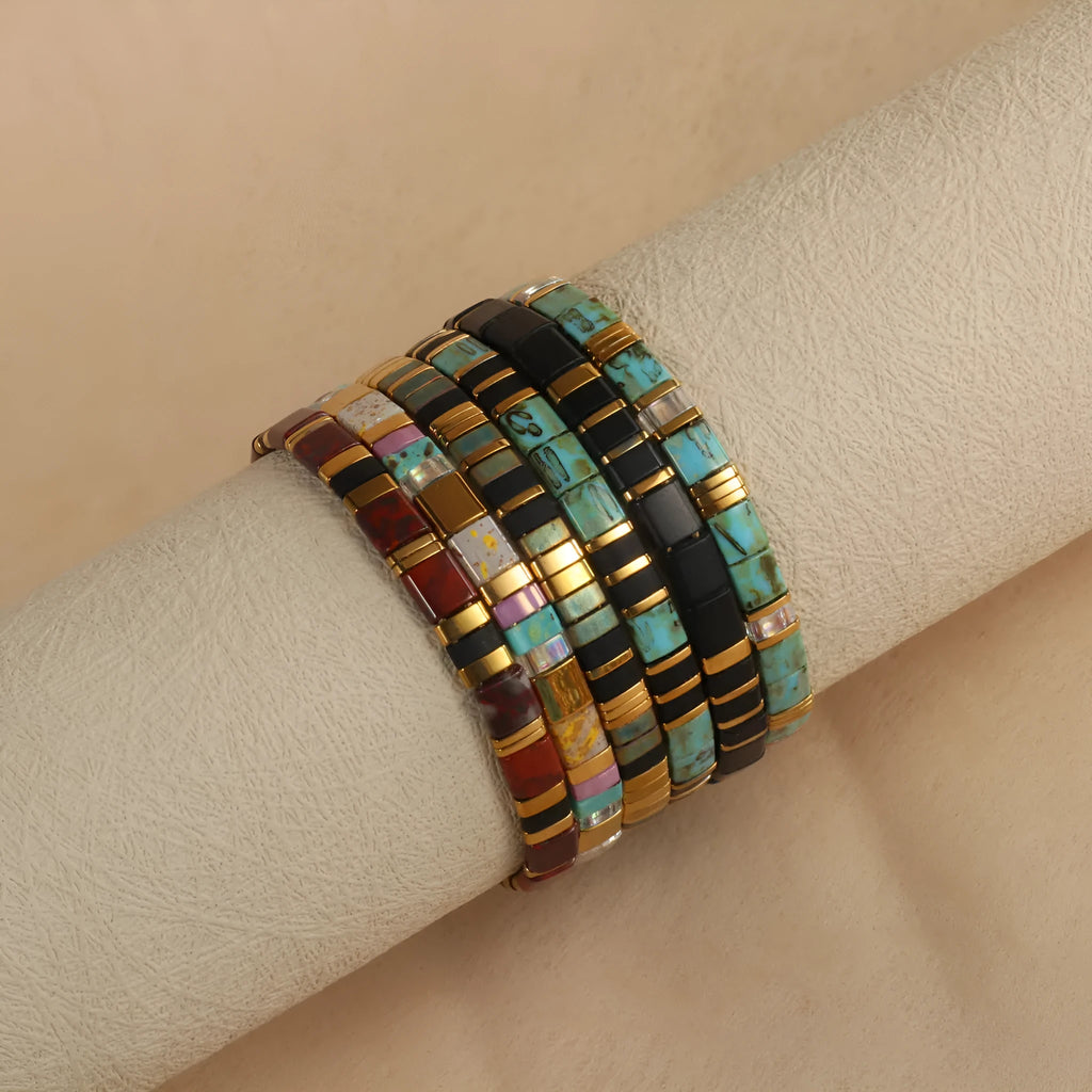 Geometric pull bead glass bracelet in multiple colour options on wrist