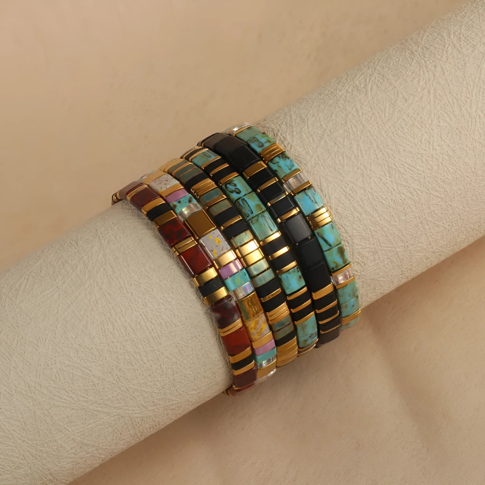 Geometric pull bead glass bracelet in multiple colour options on wrist