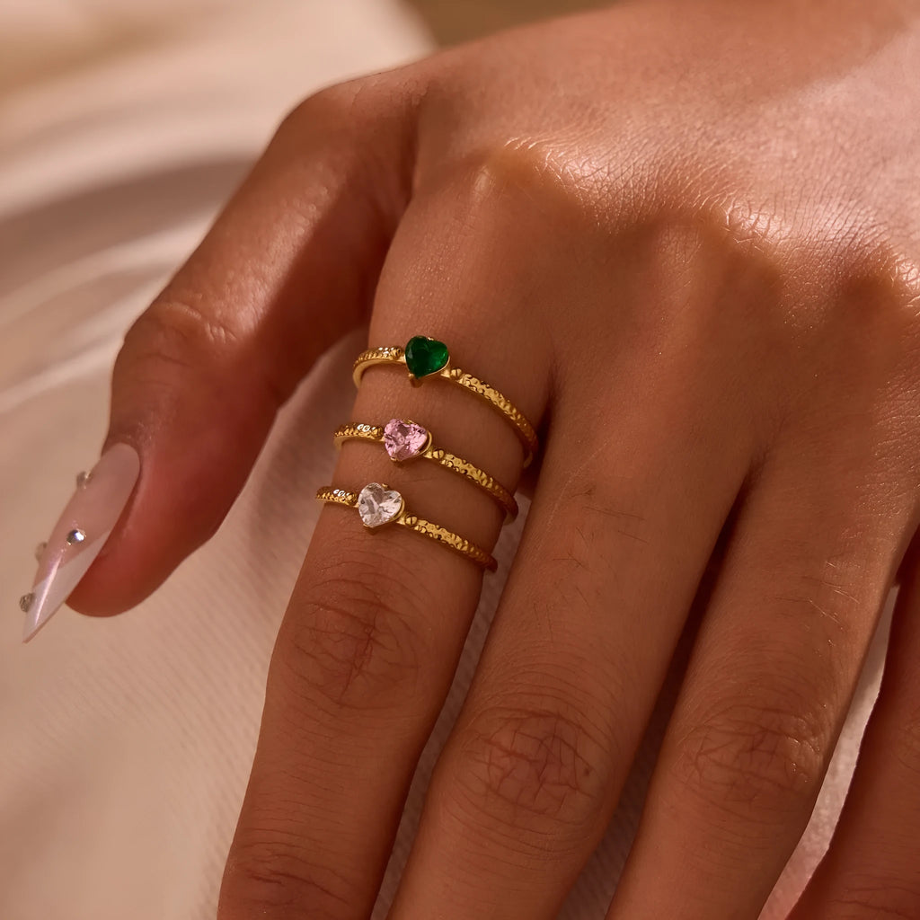 Open ended stainless steel heart ring with geometric design and inlaid zircon stones