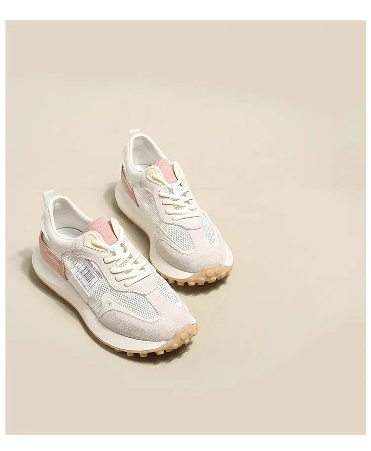 Women's grey and pink retro sneakers with low-top design and rubber sole