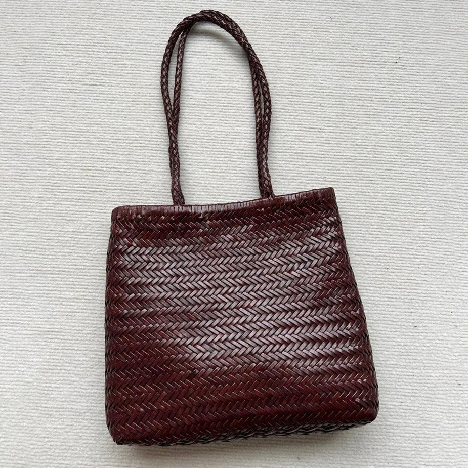 Brown handmade woven tote bag with three-dimensional pocket made from cowhide leather