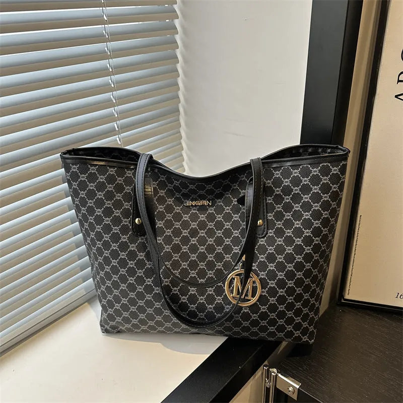 Street style shoulder bag in PU material with contrast stitching, shown in multiple colour options