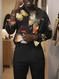 Black button-up shirt with vibrant butterfly motif, regular fit, polyester fabric, front view