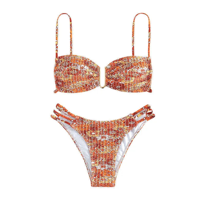 Women's floral bikini swimsuit with high-waisted briefs in solid orange colour