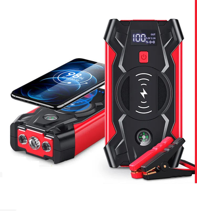 Red car emergency jump starter with digital display and thick battery clips