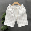 Men's black and white striped casual shorts with an ankle band and double-layer waistband.