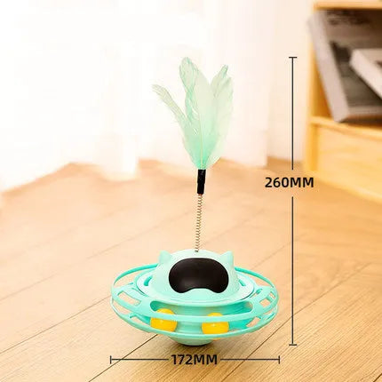 Pink plastic cat tumbler turntable stick toy with feather attachments on a white background.