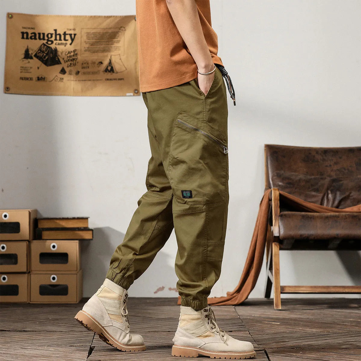 Men's khaki coloured loose fit cotton harem pants with a tapered ankle band.