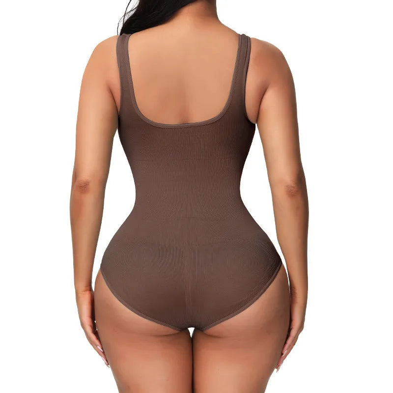 Seamless nylon bodysuit shapewear for women in apricot colour on a hanger.