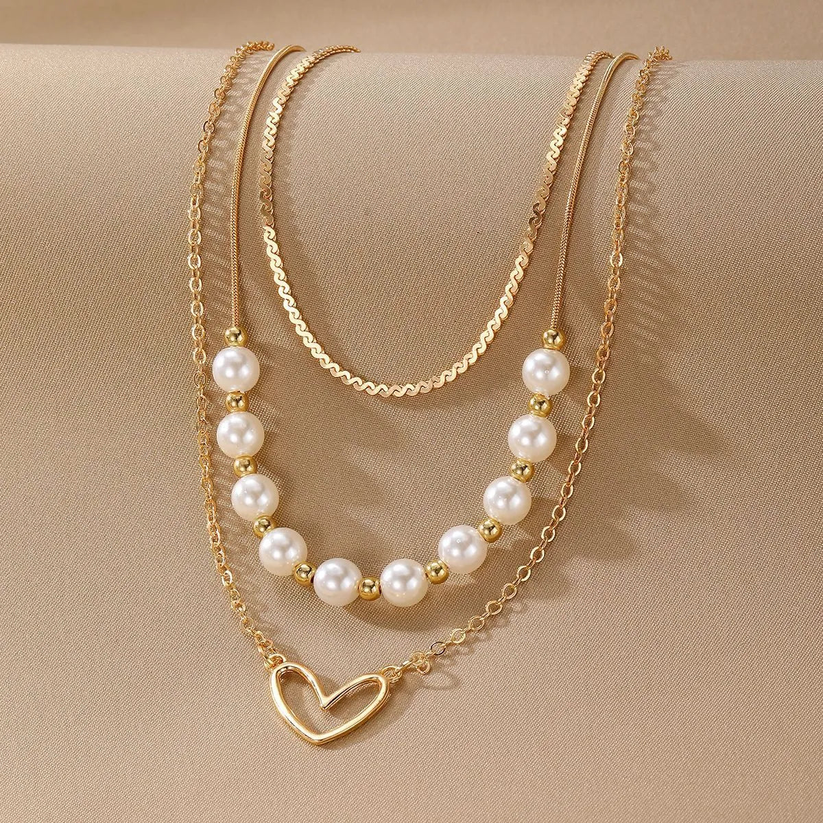Vintage gold heart pendant necklace with pearl chain design in three colour options