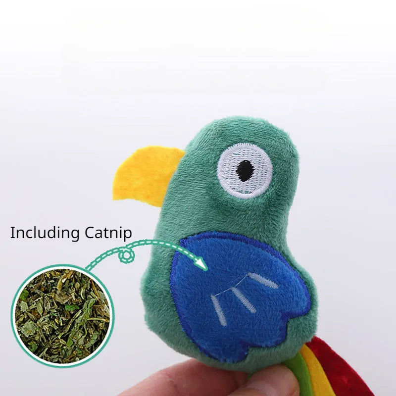 Green parrot-shaped plush cat toy with catnip filling, shown next to a cat for scale.