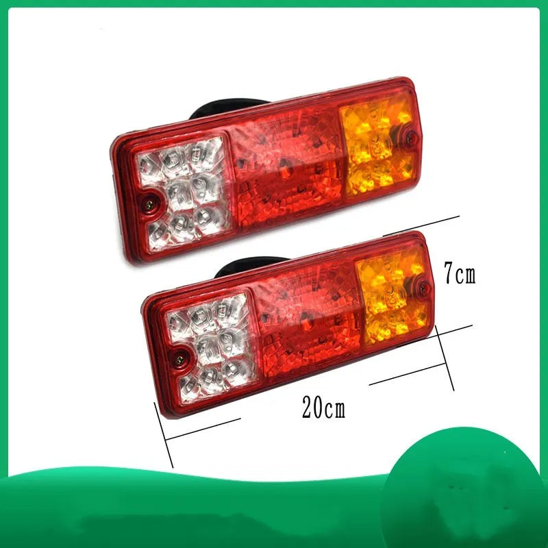 Black semi-closed taillight for electric tricycle, 200mm wide by 70mm high.