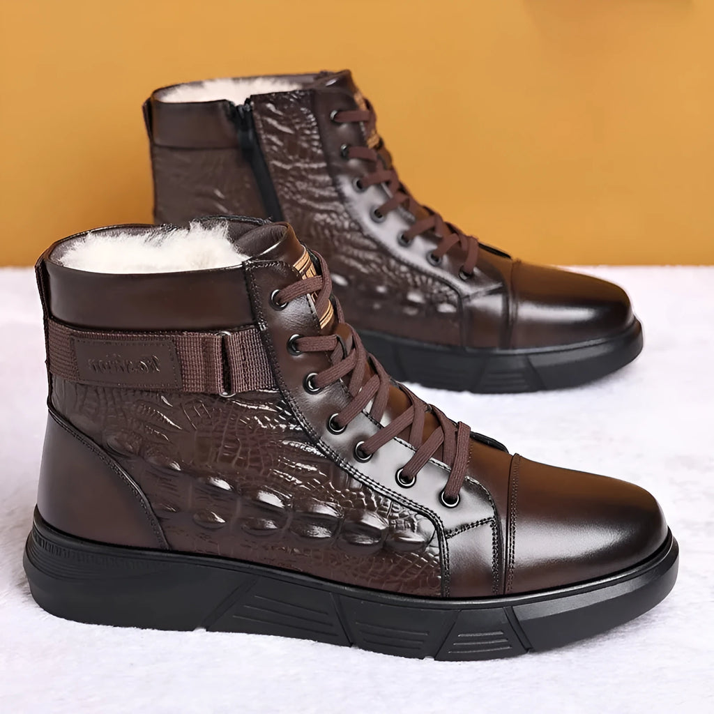 Men's black leather snow boots with fur lining, rubber sole, and lace-up front.