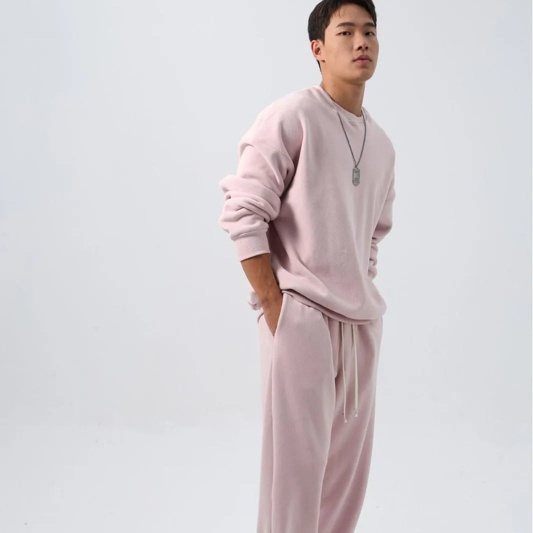 Men's polar fleece winter sports suit with long sleeve top and trousers in multiple colours.