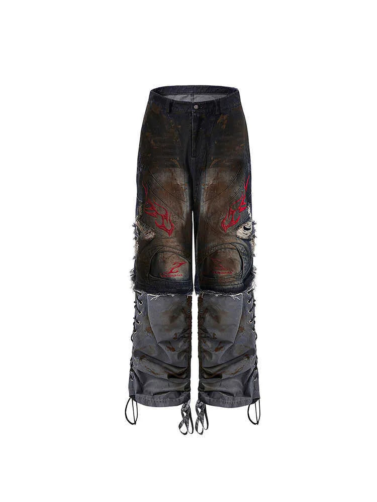 Men's retro-style denim jeans with detachable legs in a wide-leg, loose fit.