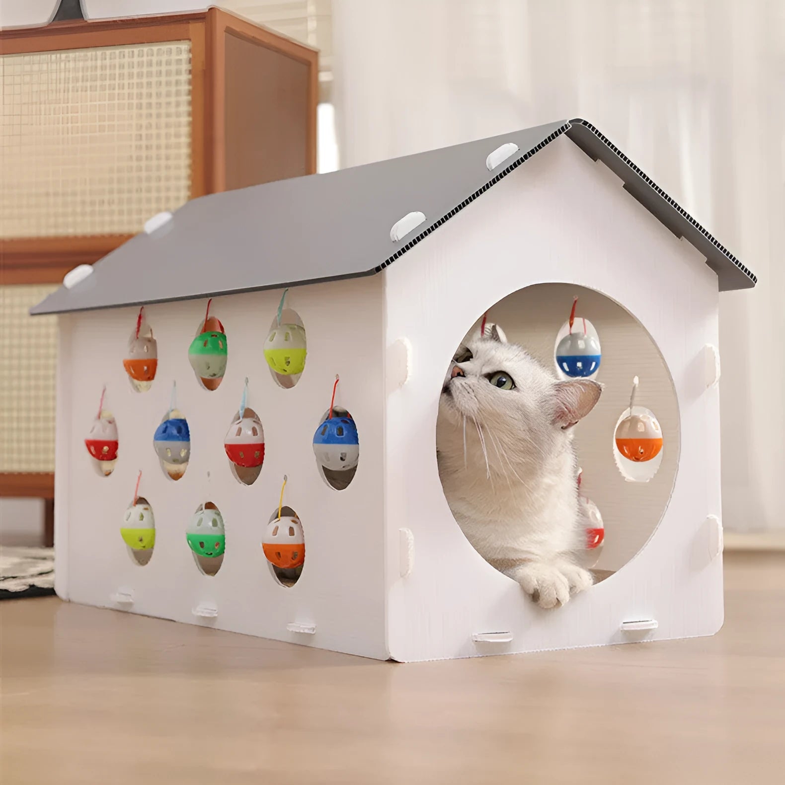 Plastic cat scratch board integrated with nest section and bell ball tunnel toy
