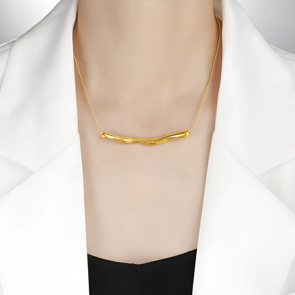 Women's titanium steel necklace with irregular pleated pendant in gold or steel electroplated finishes