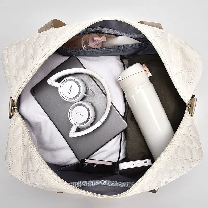 Large Oxford cloth leisure travel bag in a solid colour with a 36-55L capacity and breathable lining.