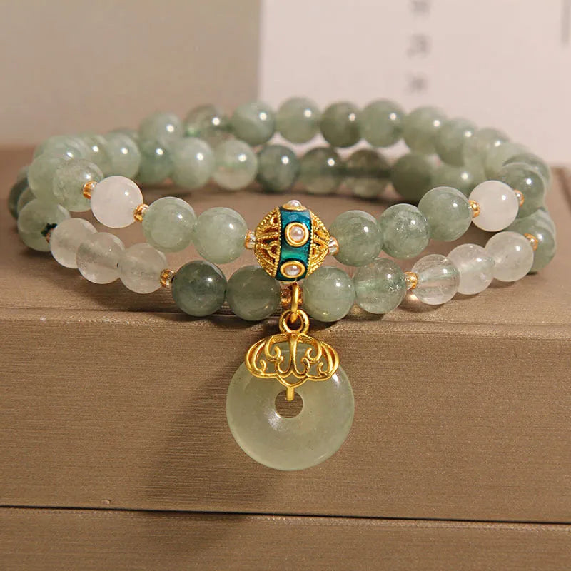 Aventurine double-layer jade bracelet with rhinestone accents and peace buckle closure in emerald green