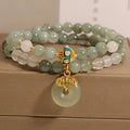 Aventurine double-layer jade bracelet with rhinestone accents and peace buckle closure in emerald green