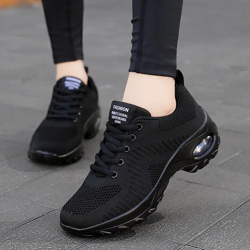 Women's red mesh sneakers with round toe and lace-up front, showing 3-5cm mid heel height