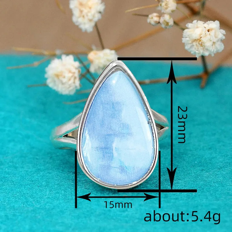 Copper ring with water drop geometric shape and white gold electroplated finish