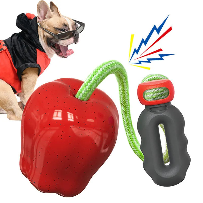 Green plastic dog molar toy with hollow centre for treats and textured chewing surfaces