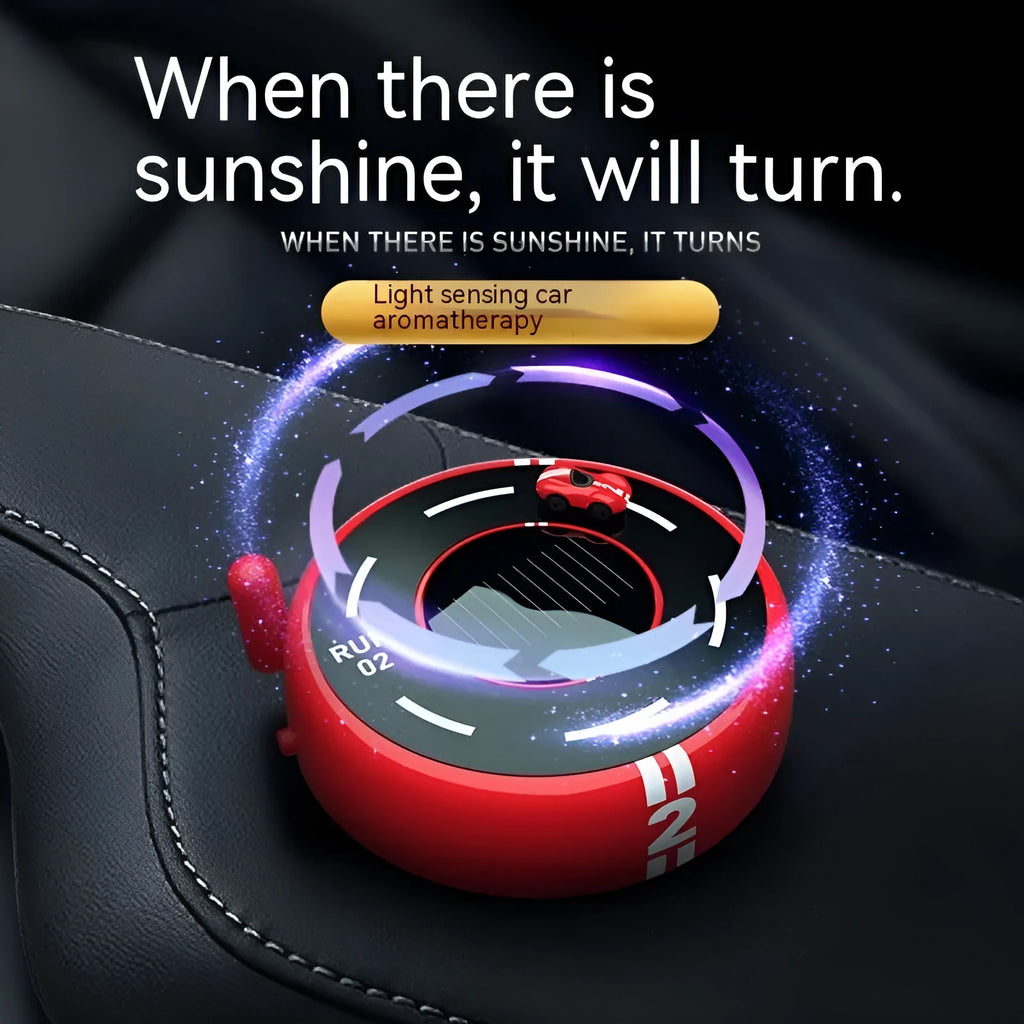 Round car-shaped solar-powered aroma diffuser ornament for vehicle interiors in black, red or white