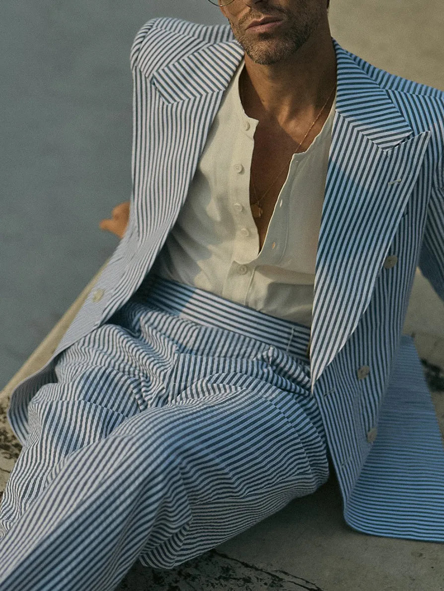 Blue and white striped polyester suit set with blazer and trousers