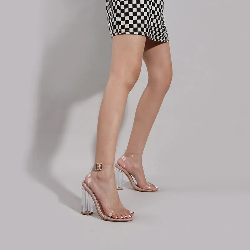 Apricot women's high heel sandals with glass-effect heels and round toe, showing buckle fastening