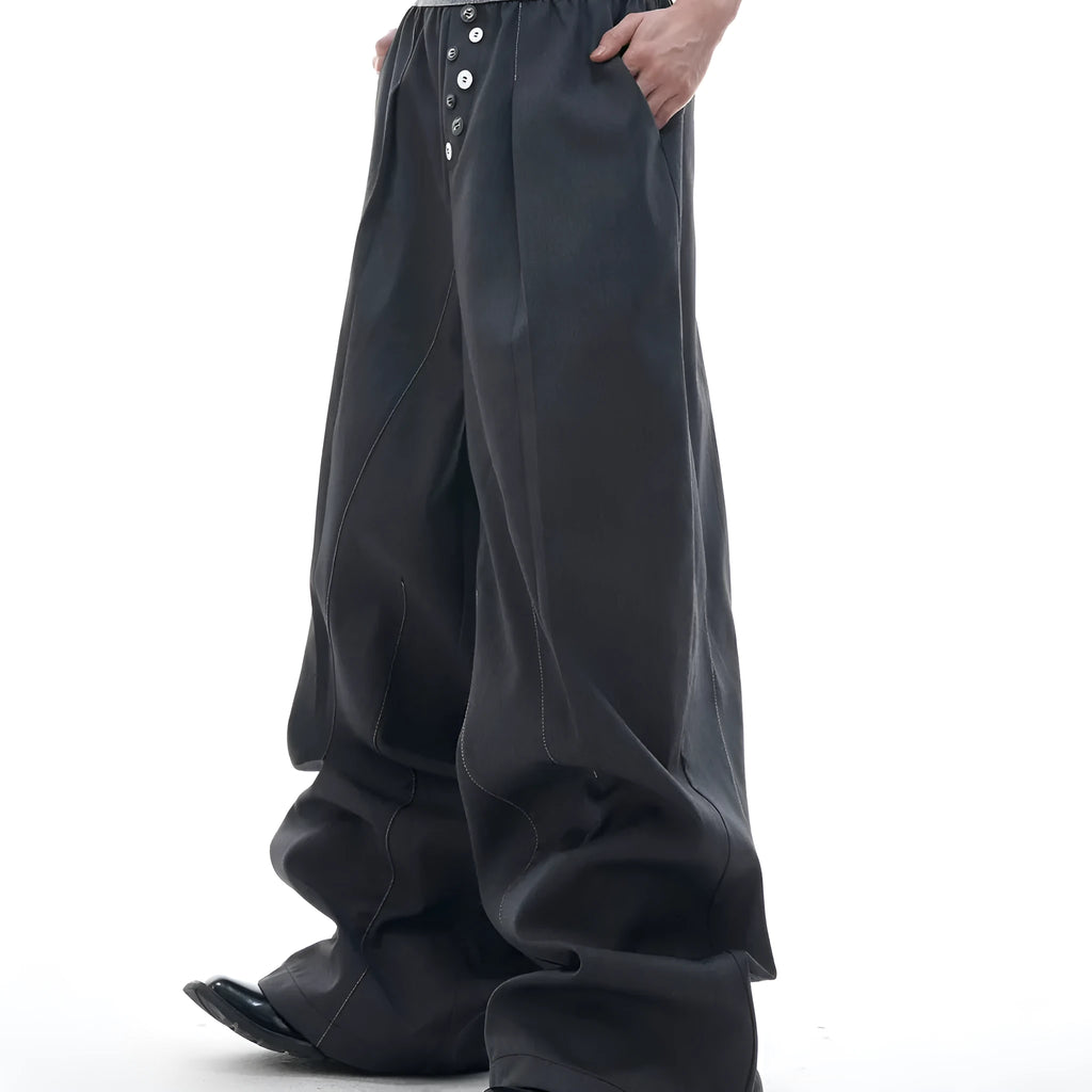 Man's black high-waisted straight-leg casual trousers with a button fly.