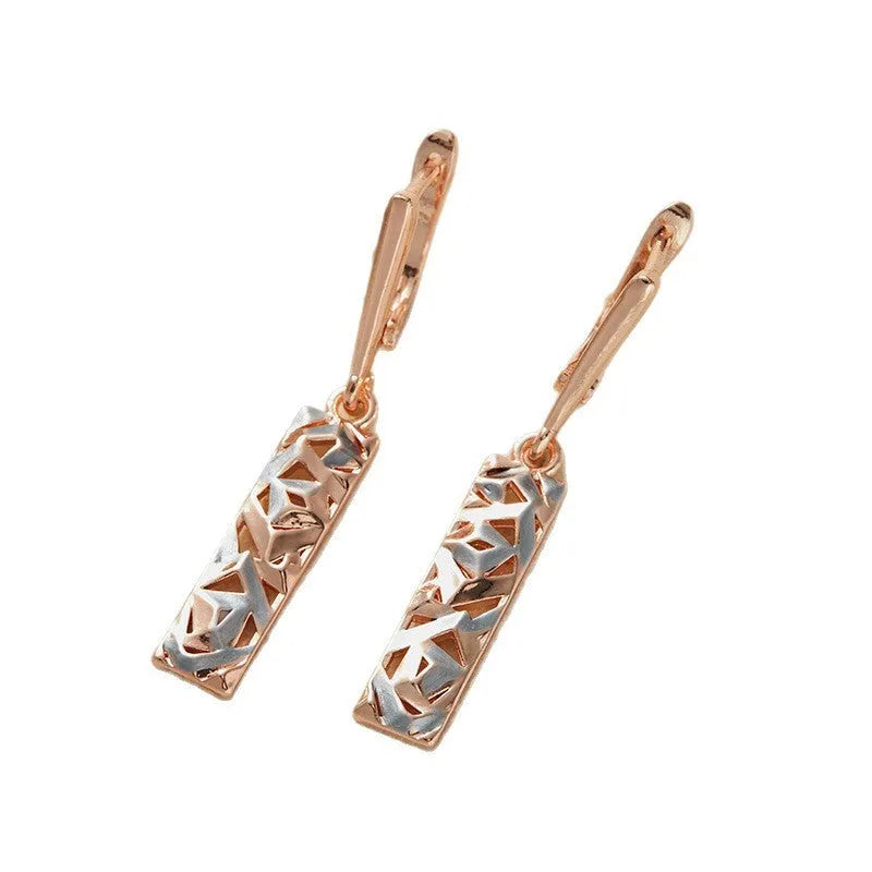 Rectangular hollow stud earrings with a two-tone picture style finish.