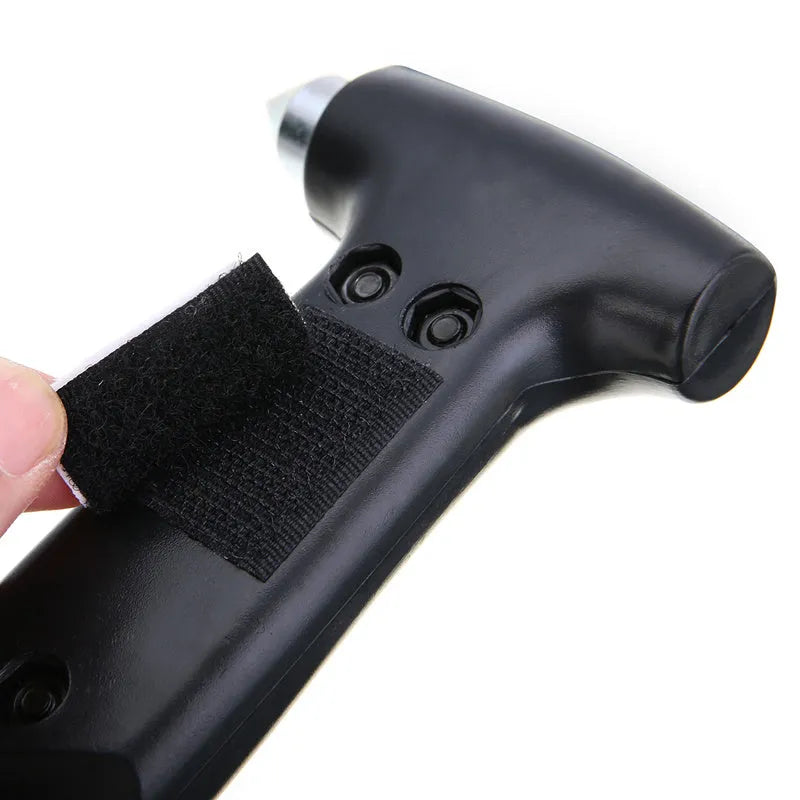 Automobile emergency multifunctional escape hammer in black plastic on white background