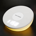 White wireless phone charger with digital clock display and three control buttons