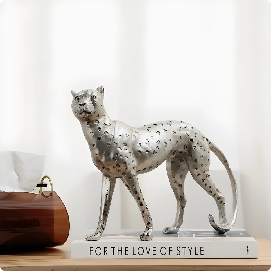 Leopard resin home ornament in American Leopard colour on wooden surface