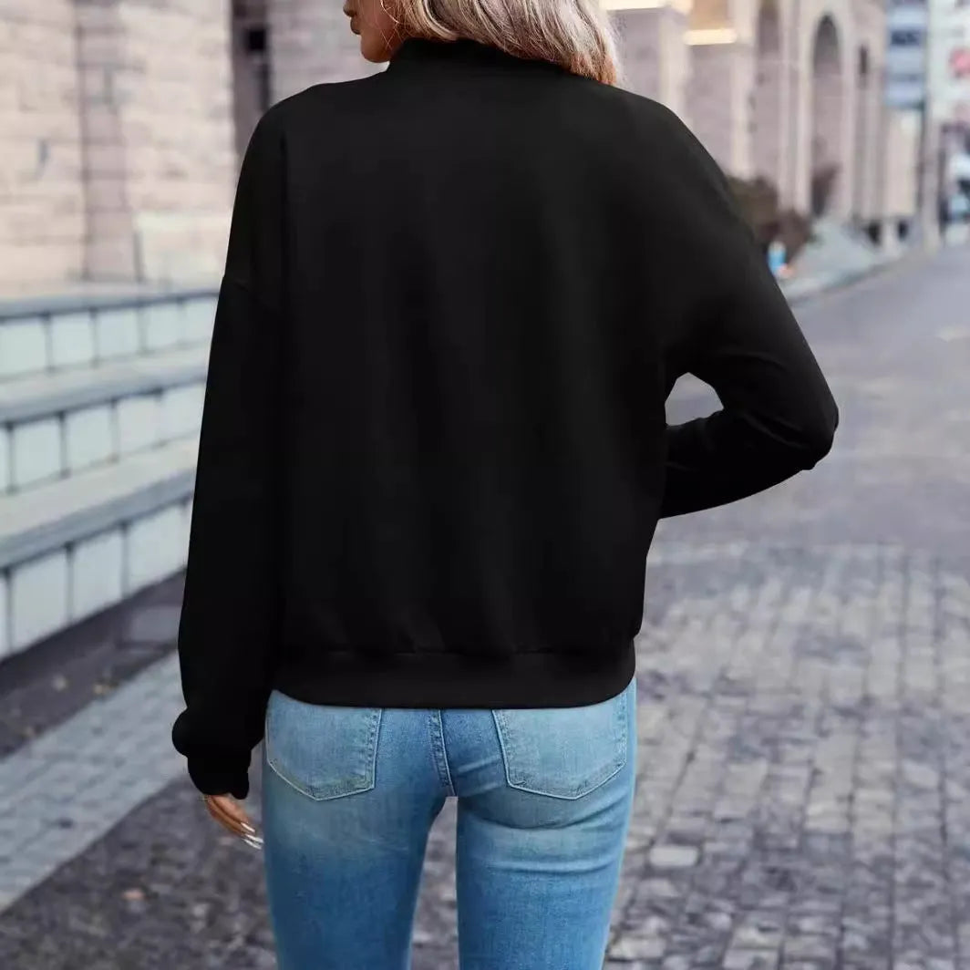 Women's black zip jacket with long sleeves and faux pocket design