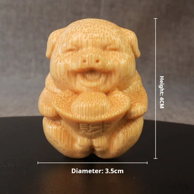 Solid bamboo carving cute ingot pig ornament, 4cm tall.