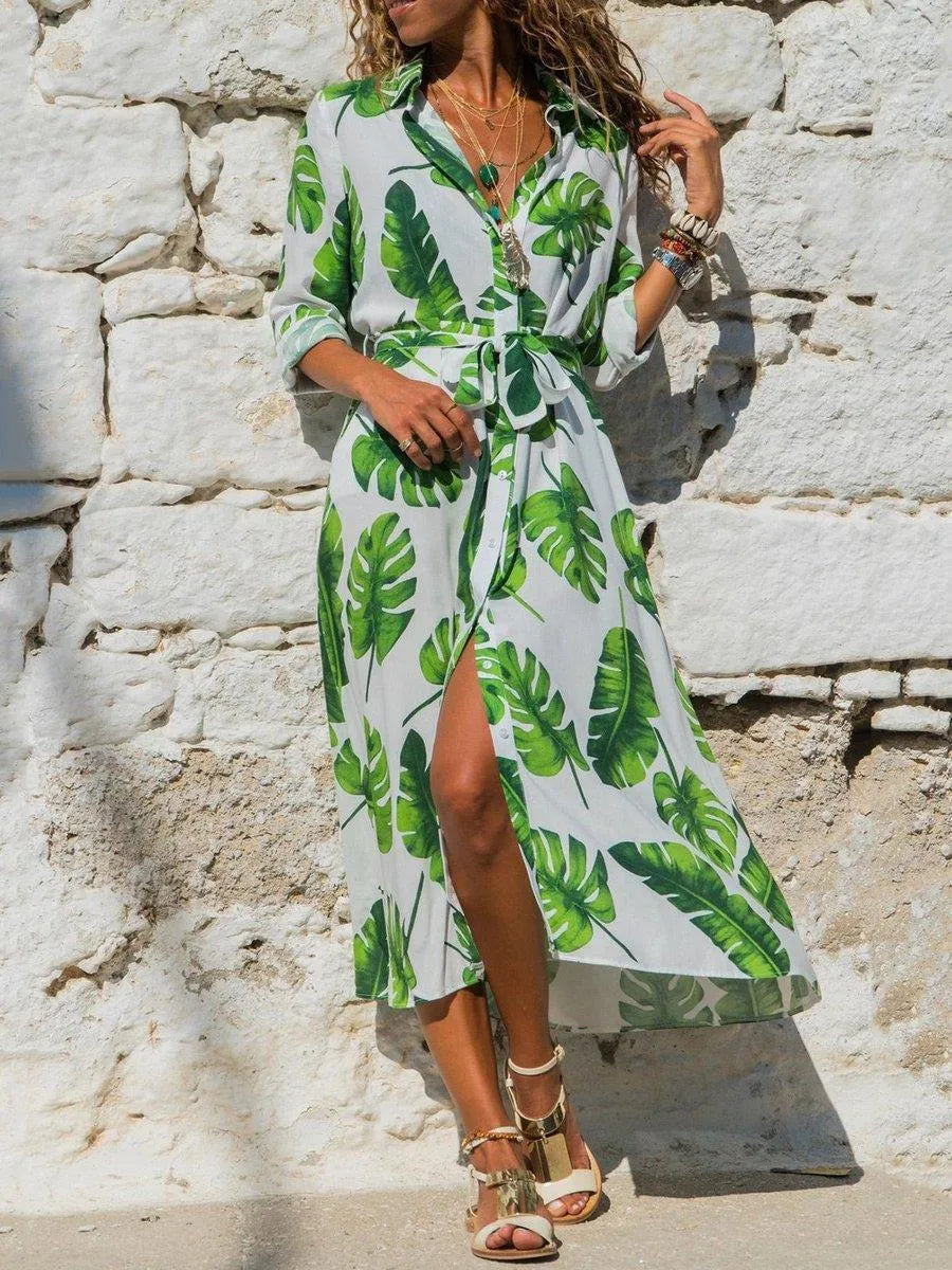 Women's vintage printed chiffon dress with V-neck collar and A-line skirt in black blue.