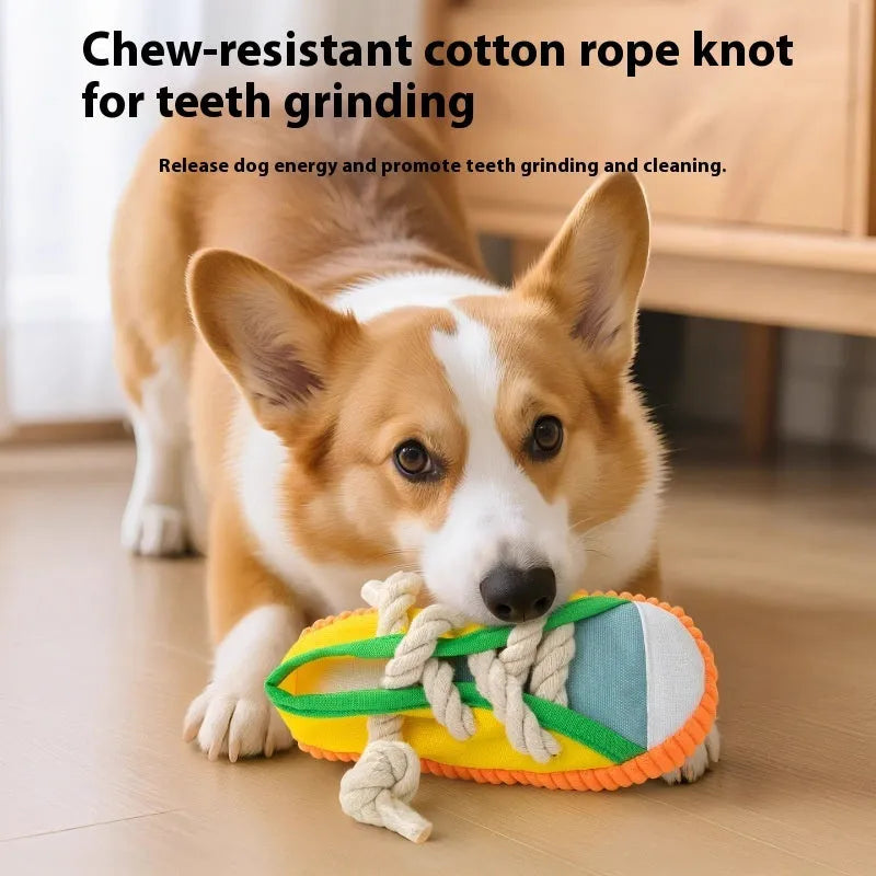 Plastic dog chew toy in three colours with bendable design and sound mechanism