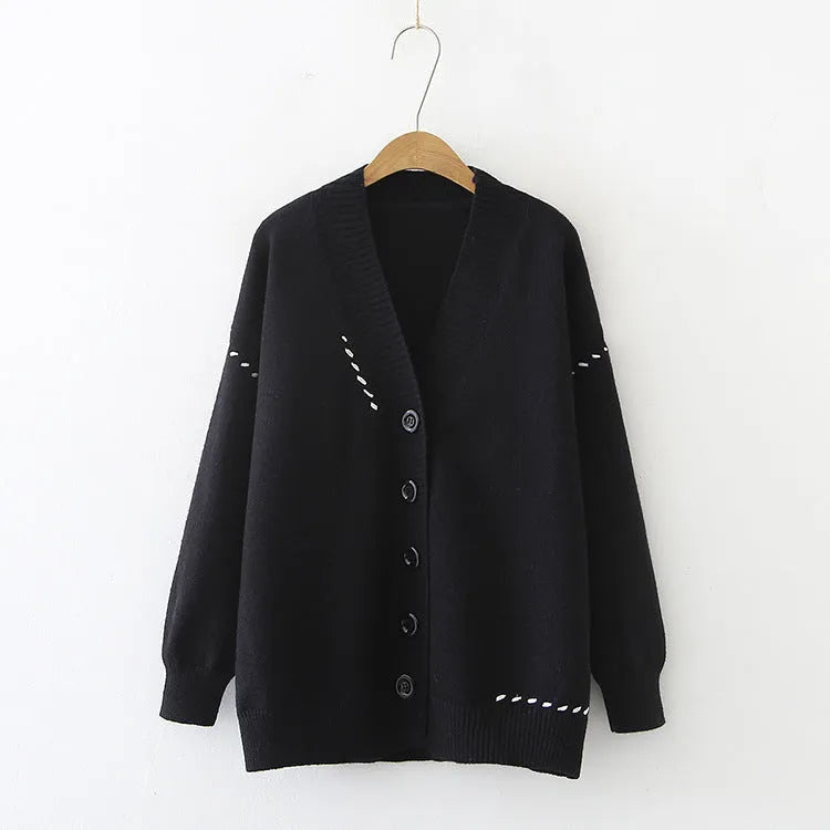 Women's loose black knitted cardigan coat with long sleeves