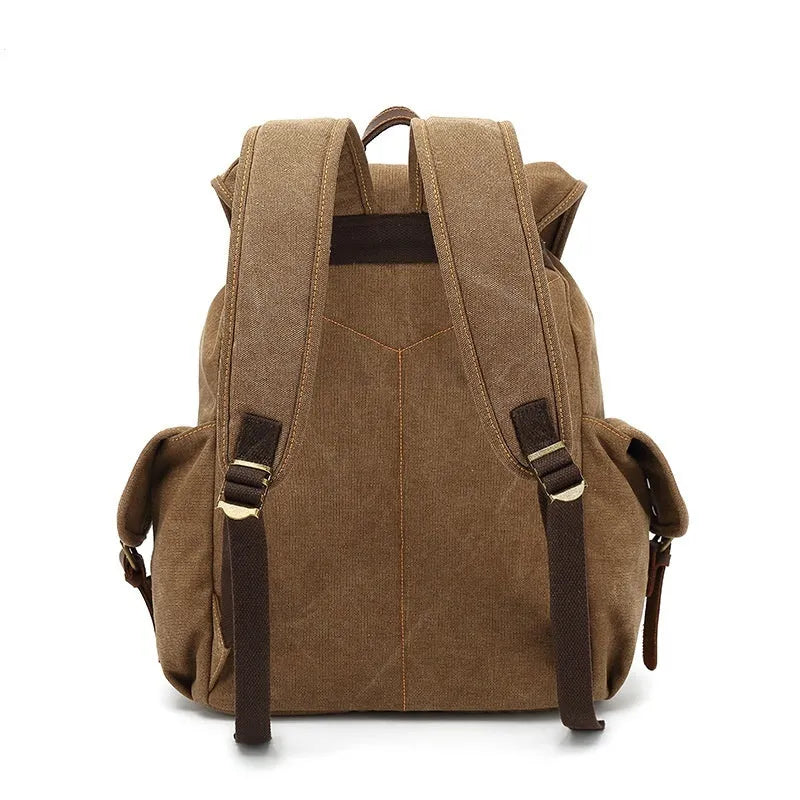 Retro canvas backpack in army green with antique bronze hardware and 16-inch laptop compartment