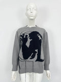 Women's grey alpaca wool pullover sweater with tassel detailing and abstract pattern