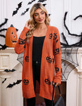 Women's black Halloween cardigan with orange pumpkin head jacquard knit pattern.