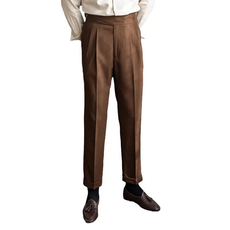 Man wearing black high-waist straight-leg casual polyester trousers for leisure.