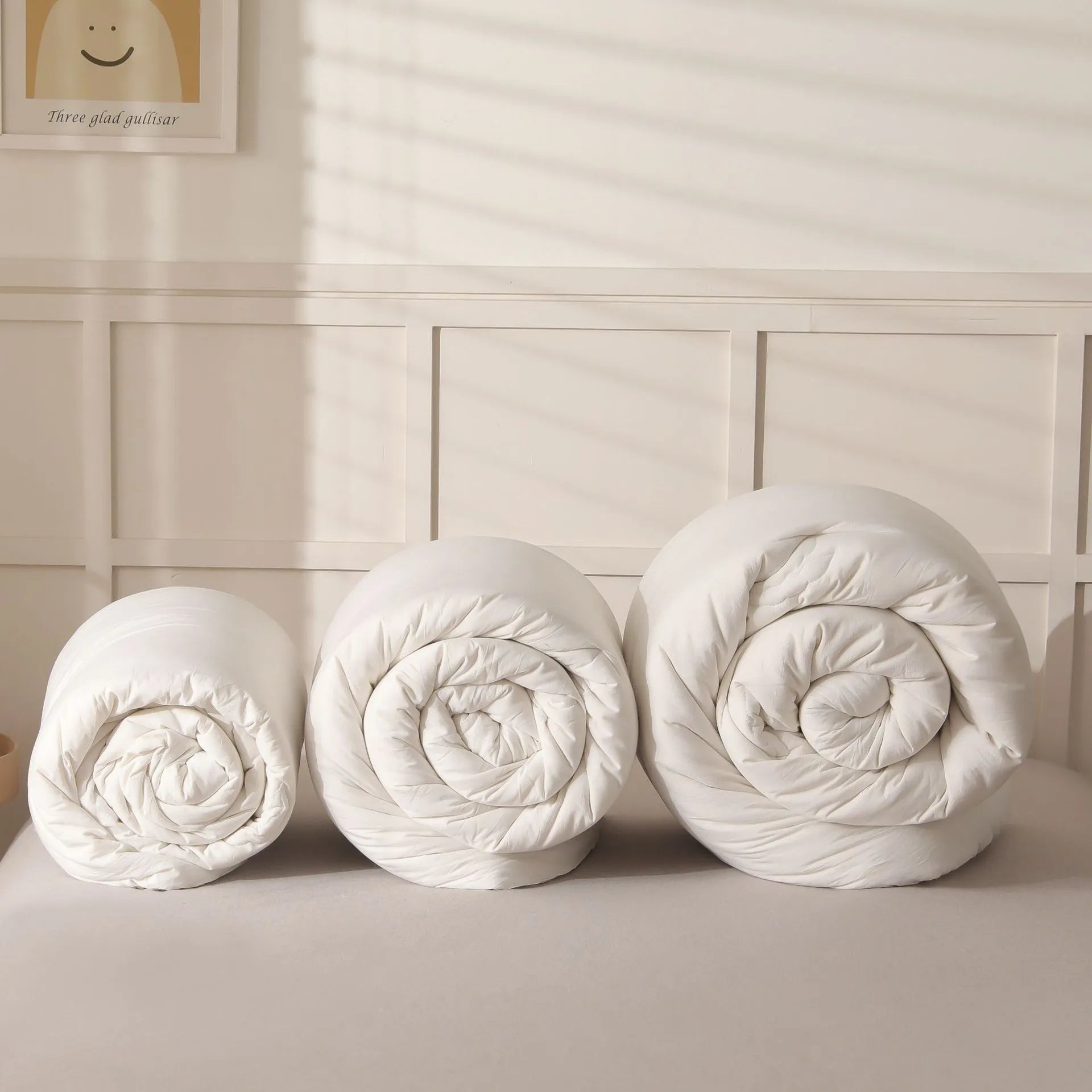 Soybean fibre pure cotton quilt shown in grey, pink jade or white colour on a bed.