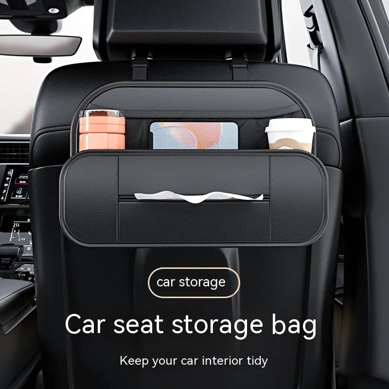 Black leather car seat rear storage bag attached to a vehicle seat, showing its storage box shape.