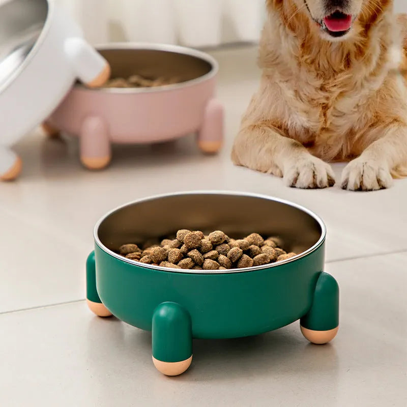 Green stainless steel pet bowl with non-slip base and raised feet for dogs and cats.