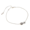 Women's alloy bracelet with a detailed pineapple charm in gold or silver tone.
