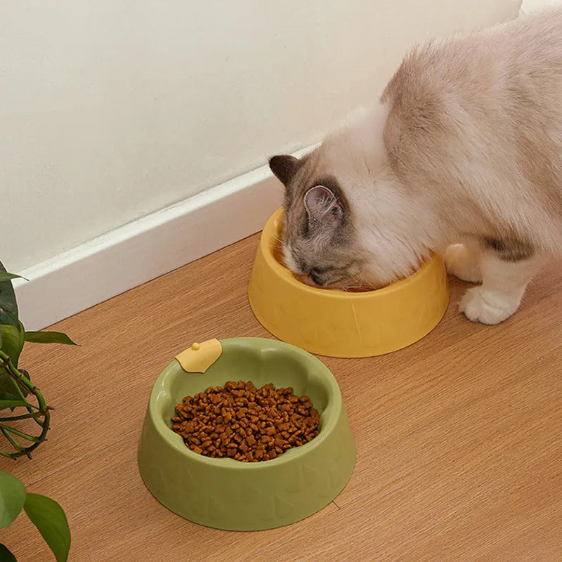 Green plastic double pet bowl with anti-tipping design for dog and cat food and water